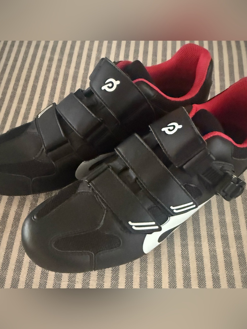 Peloton Cycling Shoes with White Swoosh and Red Lining
